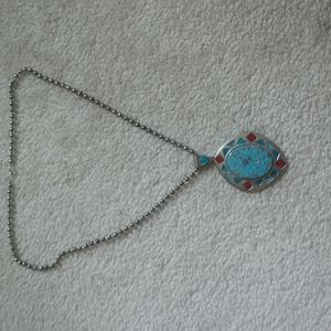 Stone and metal pendant with 925 silver chain